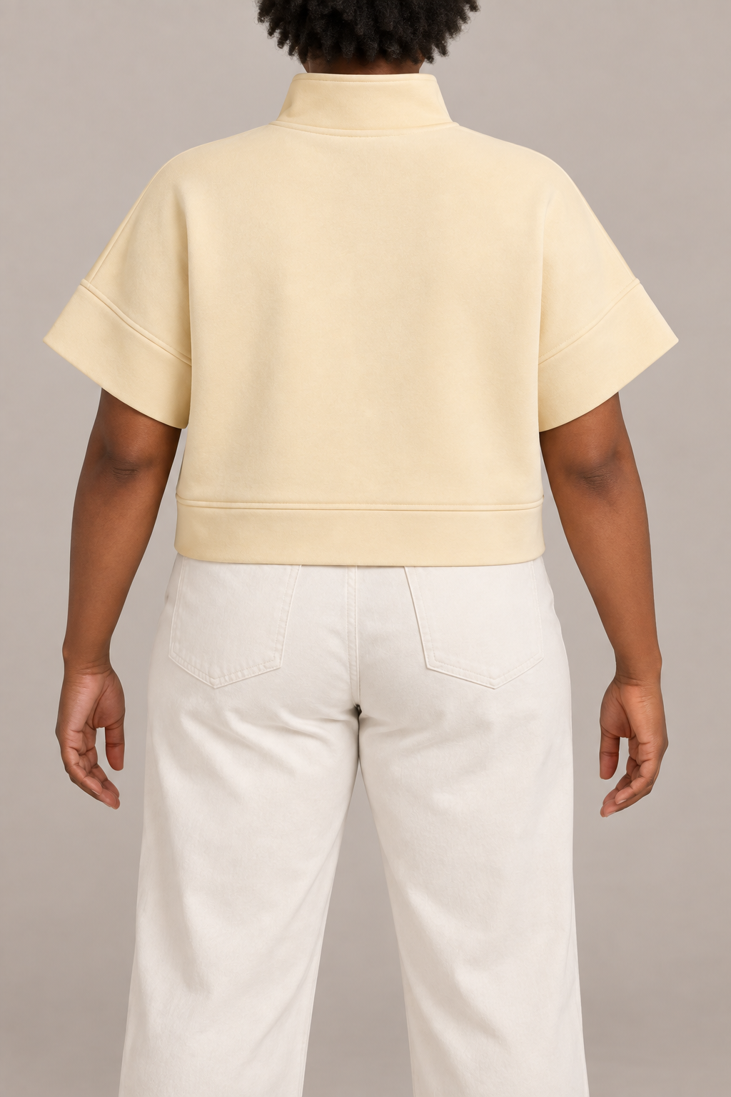 Soft Interval Zip Sweatshirt in Apricot. Rear view showing the plain back and cropped hem band.