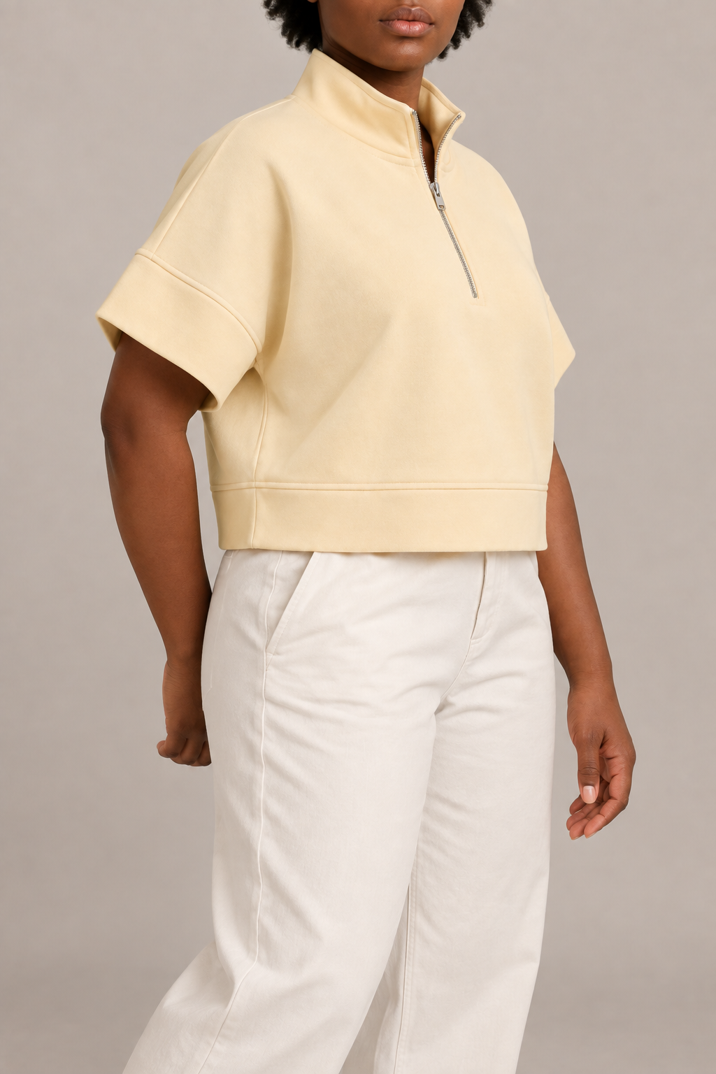 Soft Interval Zip Sweatshirt in Apricot. Three-quarter view showing the boxy shape and wide sleeve opening.