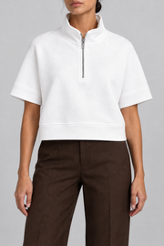 Soft Interval Zip Sweatshirt in White. Front view showing the stand collar and short metal zip.