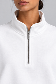 Soft Interval Zip Sweatshirt in White. Collar closeup showing the silver quarter zip and smooth white knit.