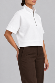 Soft Interval Zip Sweatshirt in White. Three-quarter view showing the wide sleeve band and boxy shape.