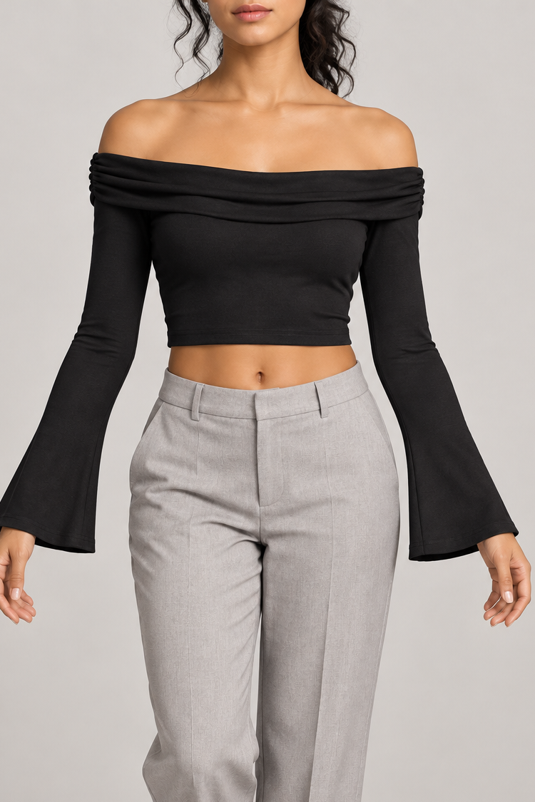 Quiet Fold Bell Sleeve Top in Black. Front view showing the folded off-shoulder neckline and bell sleeves.