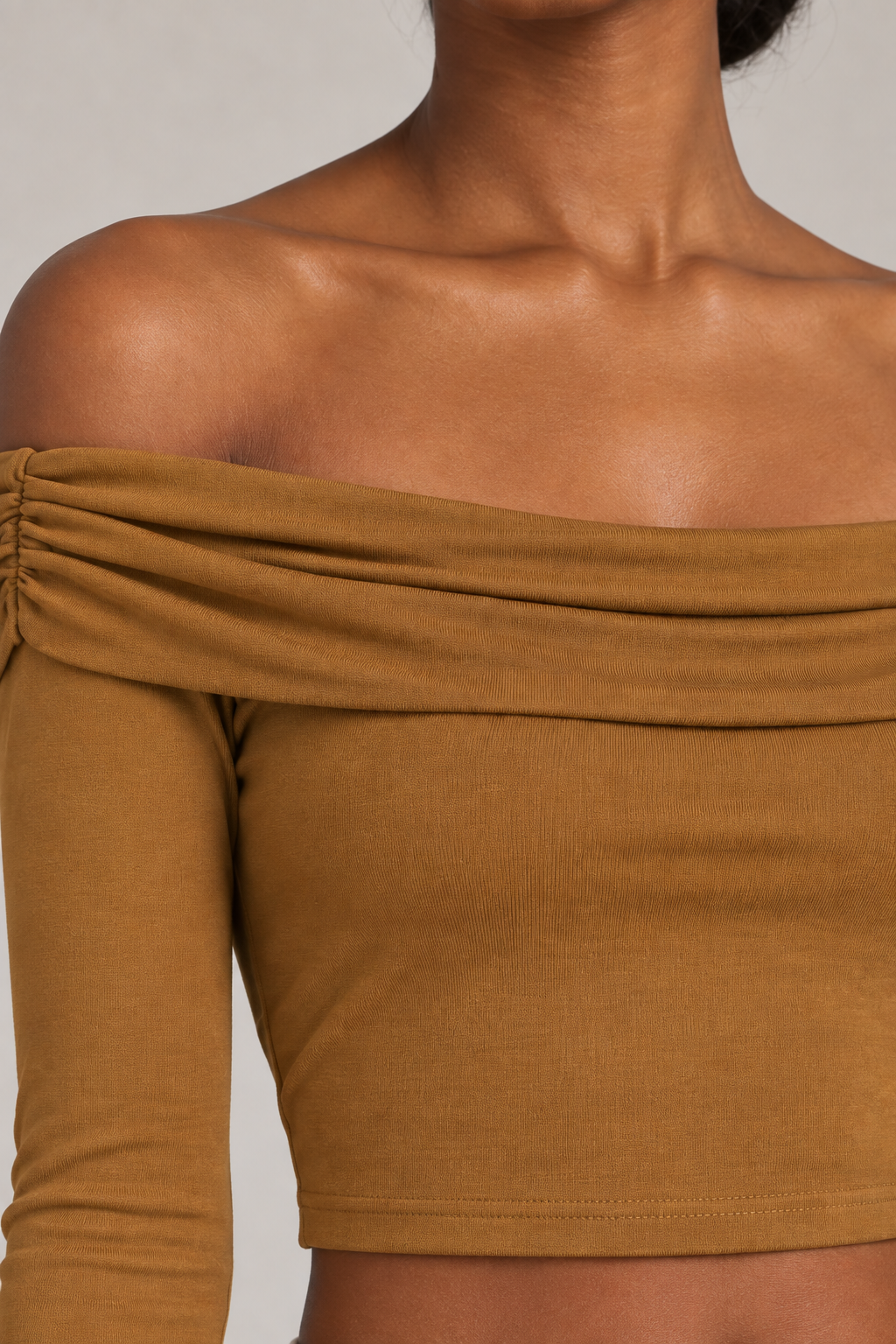 Quiet Fold Bell Sleeve Top in Brown. Neckline closeup showing the folded brown knit and gathered edge.