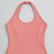 Open Line Halter Jumpsuit in Pink. Flat-lay close-up showing the halter neck loop, bound edging and bodice shaping seams.