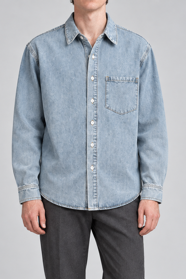 Front view of Worn Line Denim Shirt in Blue, showing the pale washed plain denim, white buttons and single patch pocket.