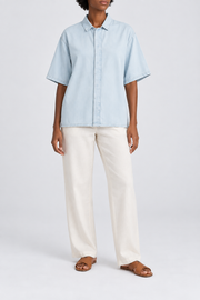 Front view of Soft Current Lyocell Shirt in Light Blue, showing the plain washed fabric and concealed button front.