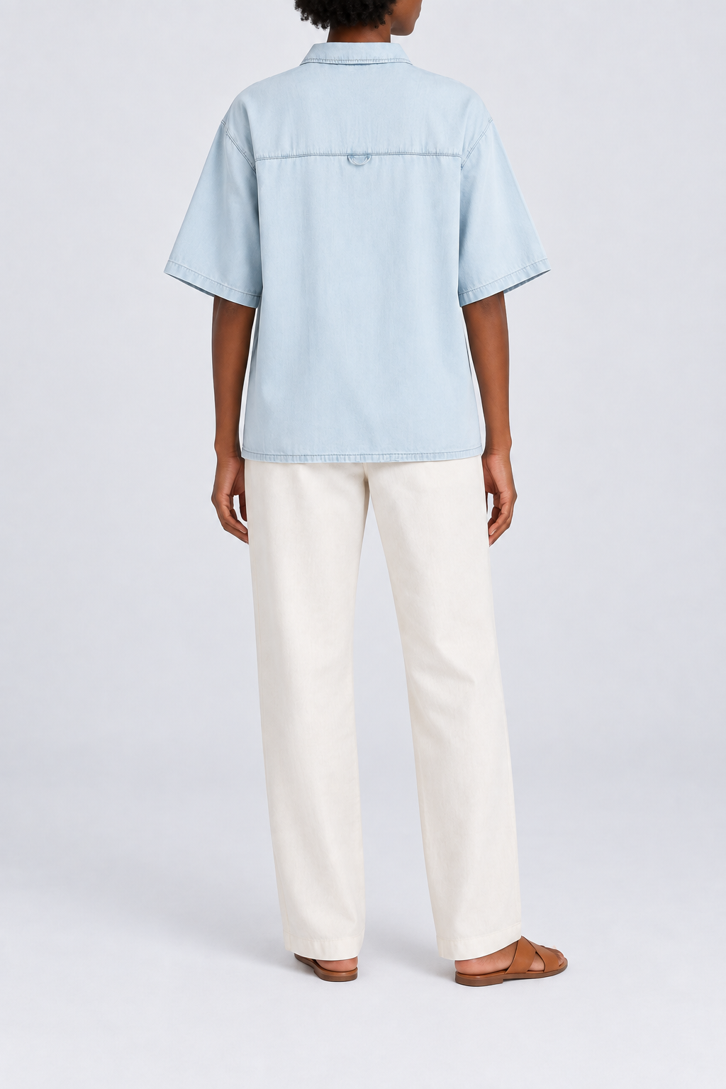 Rear view of Soft Current Lyocell Shirt in Light Blue, showing the back yoke, small hanging loop and straight hem.