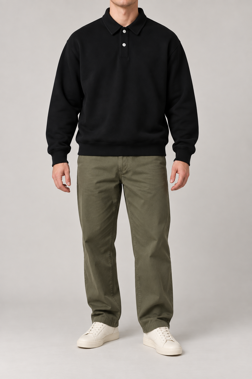 Front view of Quiet Club Polo Sweatshirt in Black, showing the plain design, two-button collar and ribbed hem.