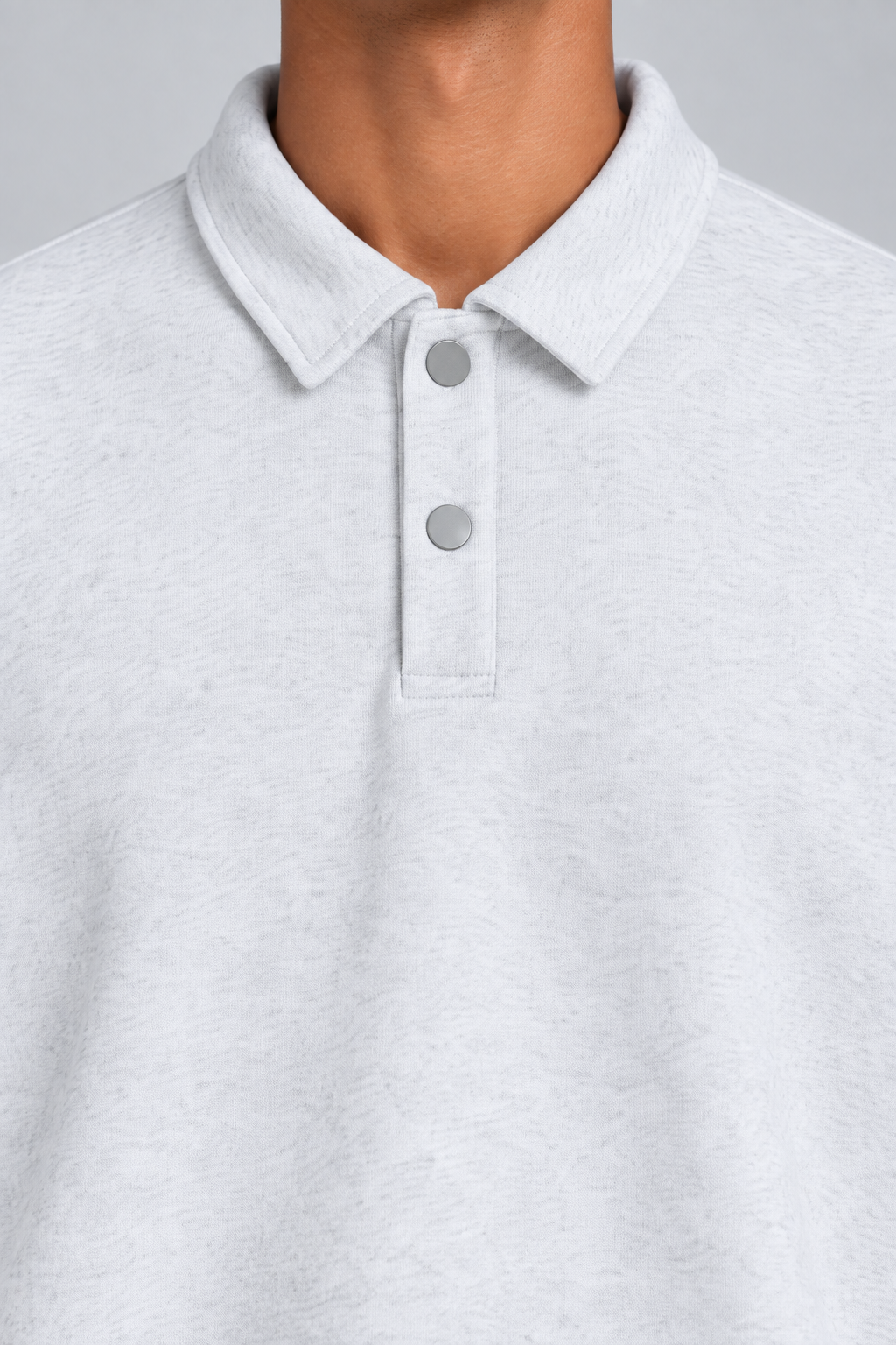Quiet Club Polo Sweatshirt in Flower Gray. Close-up showing the pointed collar, two pale buttons and subtle heather texture.