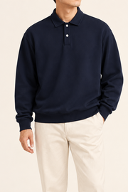 Quiet Club Polo Sweatshirt in Dark Blue. Front view showing the plain body and two-button polo collar.