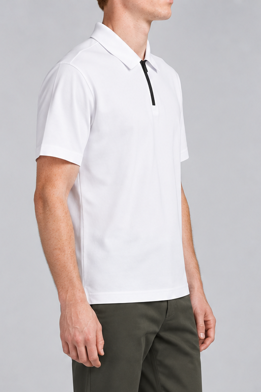 Clean Interval Zip Polo in White. Three-quarter side view showing the short sleeves and straight hem.