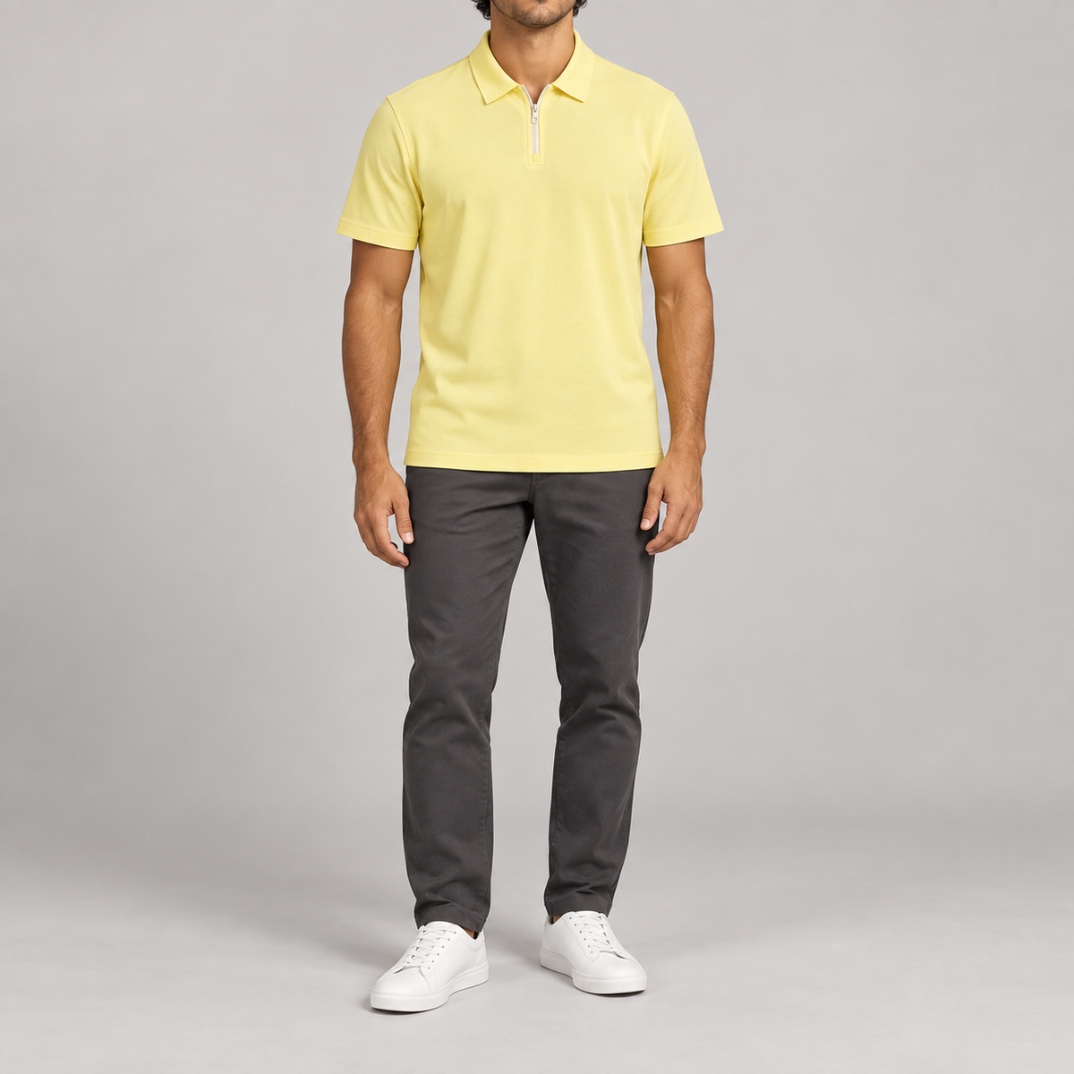 Clean Interval Zip Polo in Light Yellow. Front view showing the plain yellow body and pale quarter zip.