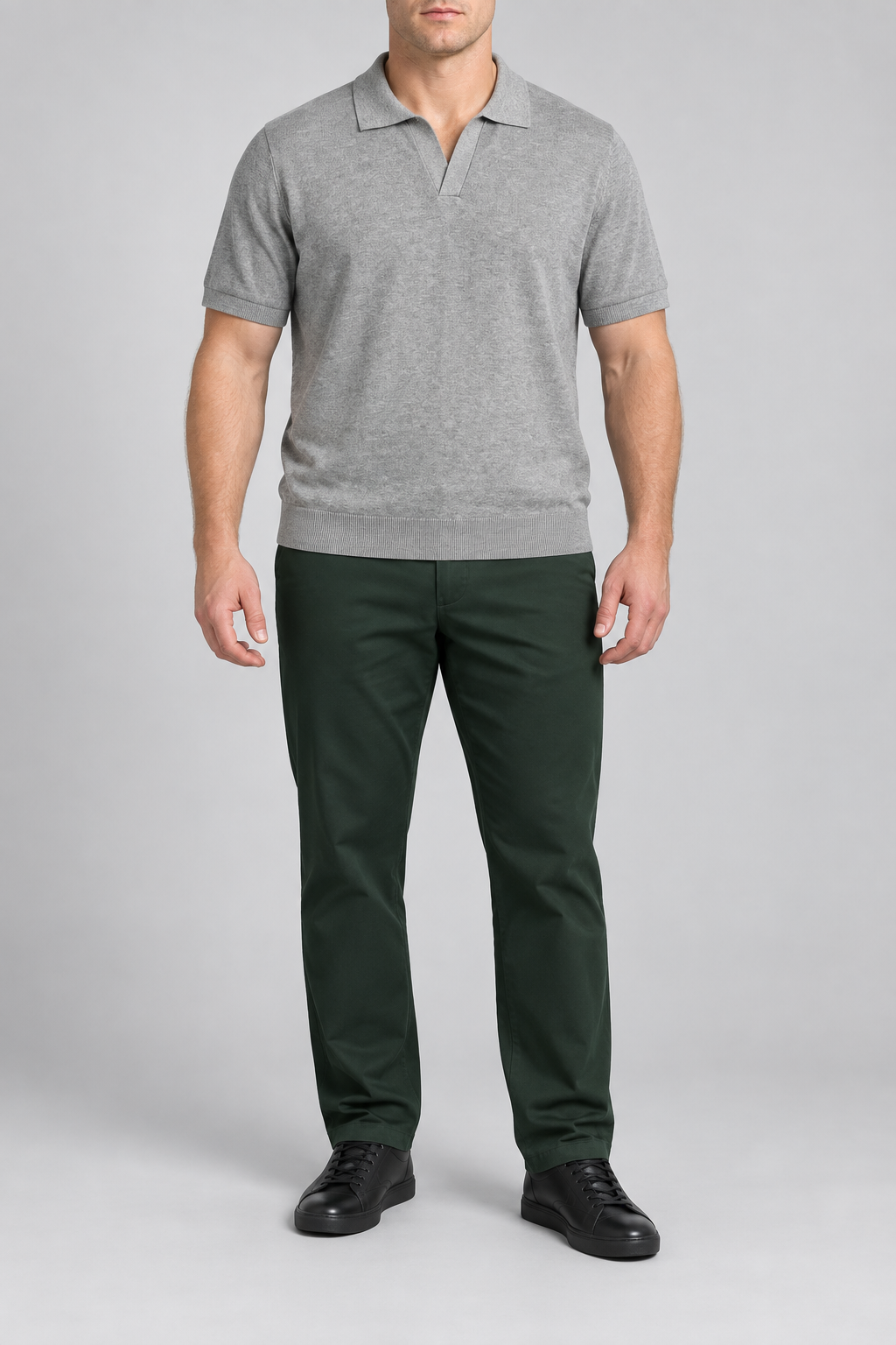 Front studio view showing the plain heather knit and open collar of Still Hour Knit Polo in Flower Gray.