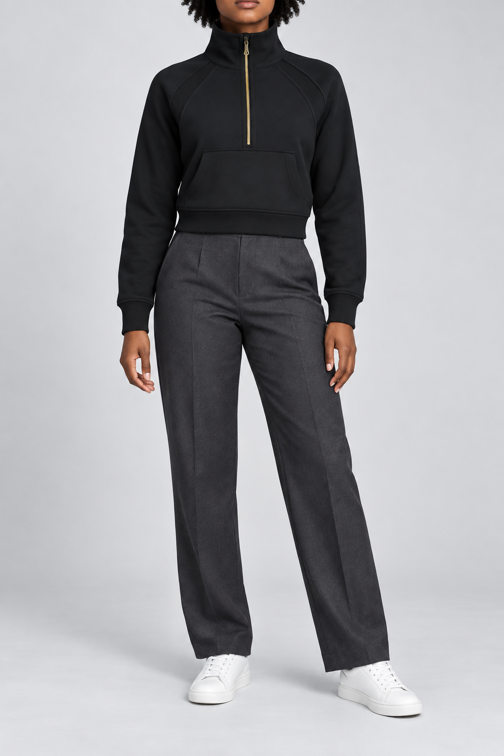 Front studio view showing the gold-tone half zip and kangaroo pocket of Curve Interval Half-Zip Sweatshirt in Black.