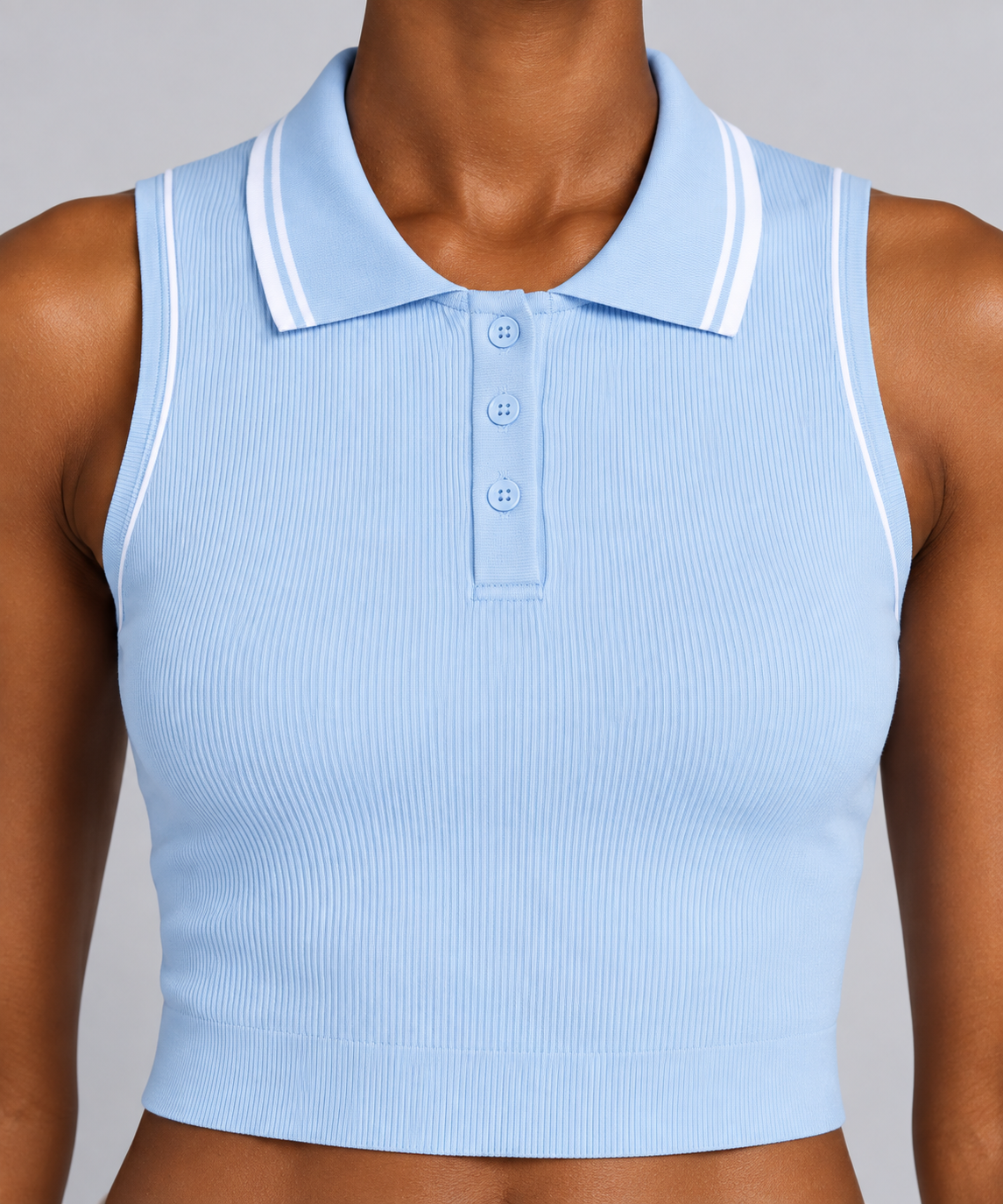 Close-up studio view showing the three blue buttons and white collar stripes of Court Line Polo Tank in Blue with White.