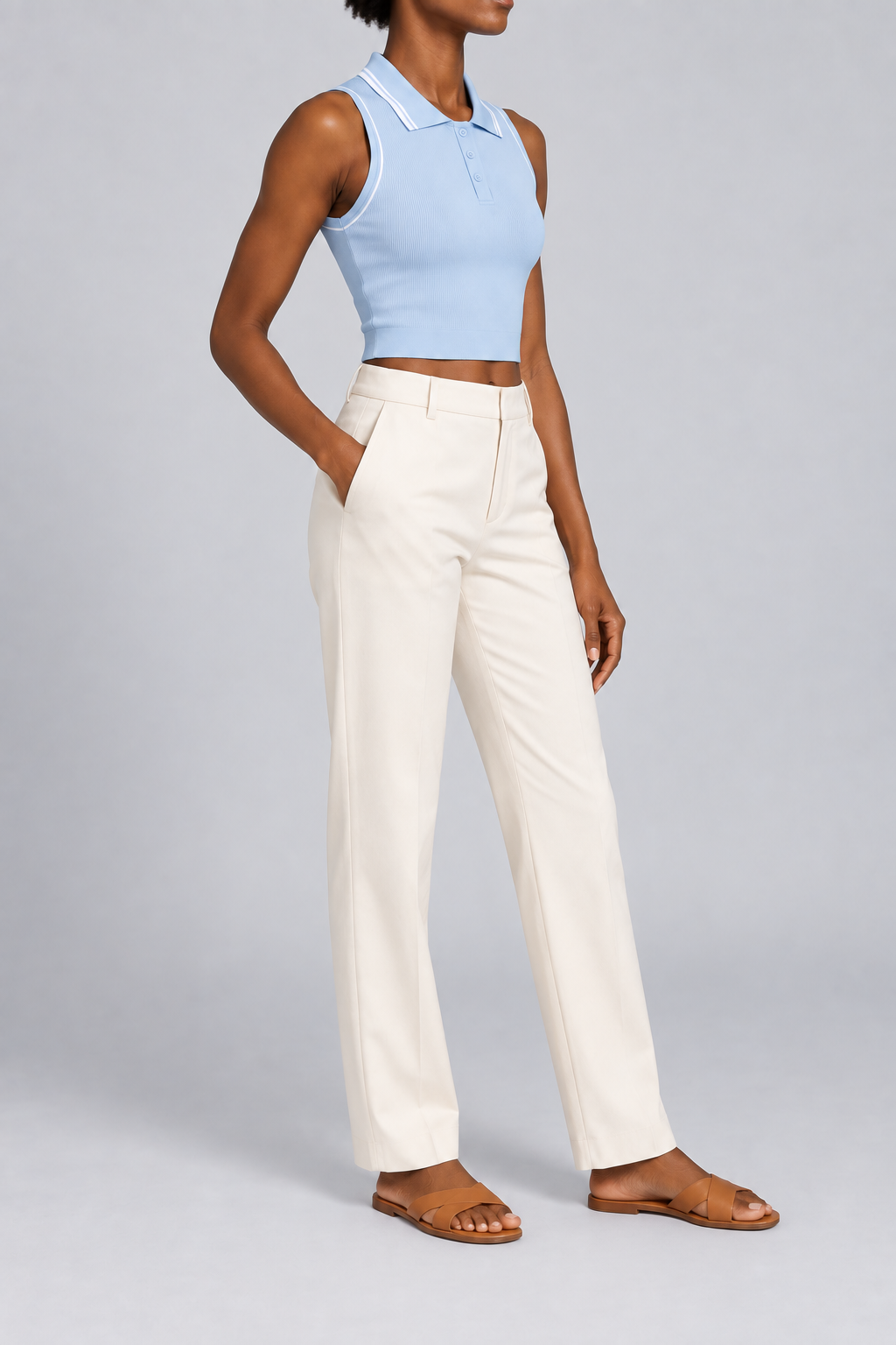 Three-quarter side studio view showing the ribbed texture and bound armholes of Court Line Polo Tank in Blue with White.