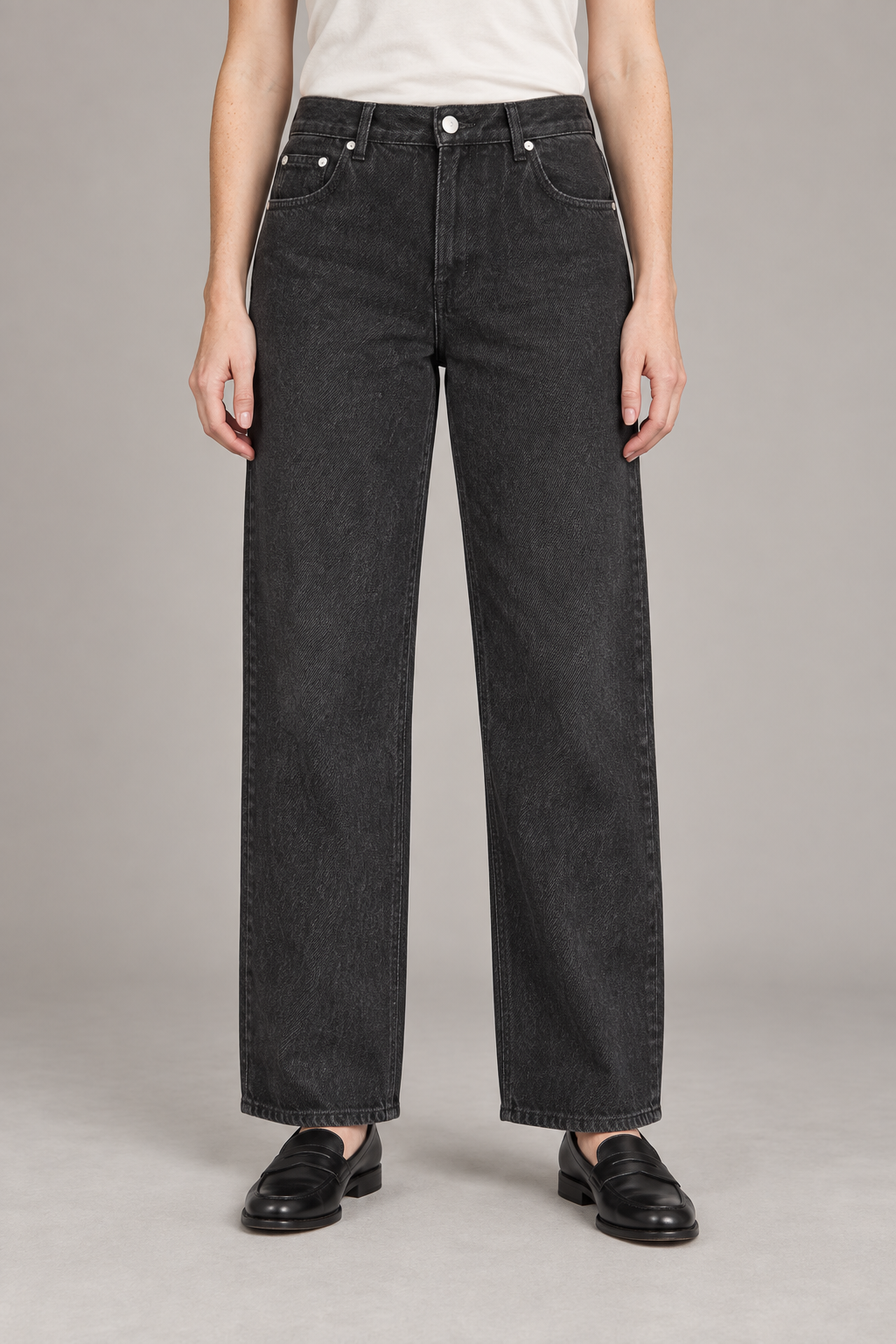 Worn Rhythm Straight Jeans in Black. Front studio view showing the loose straight legs and washed black denim.