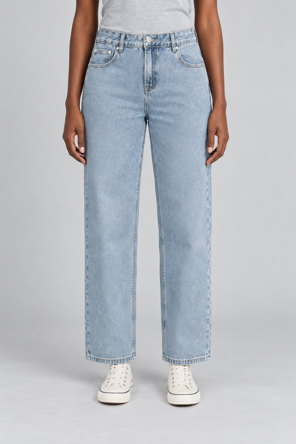 Worn Rhythm Straight Jeans in Blue. Front studio view showing the loose straight legs and pale washed blue denim.