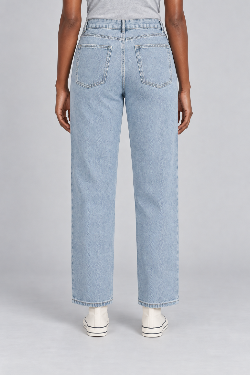 Worn Rhythm Straight Jeans in Blue. Rear studio view showing two plain patch pockets and neat topstitching.