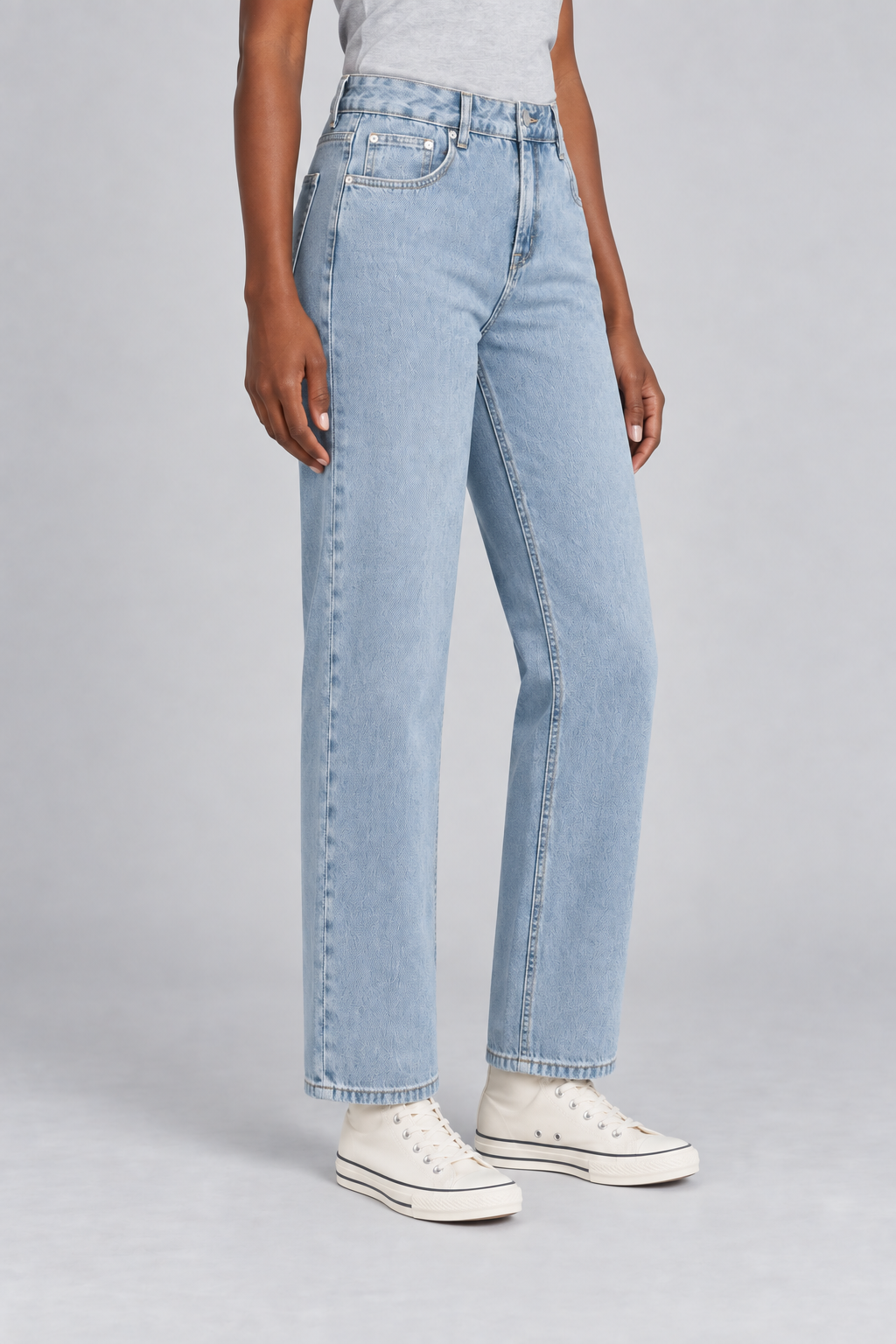 Worn Rhythm Straight Jeans in Blue. Three-quarter studio view showing the straight cut and ankle-length hems.