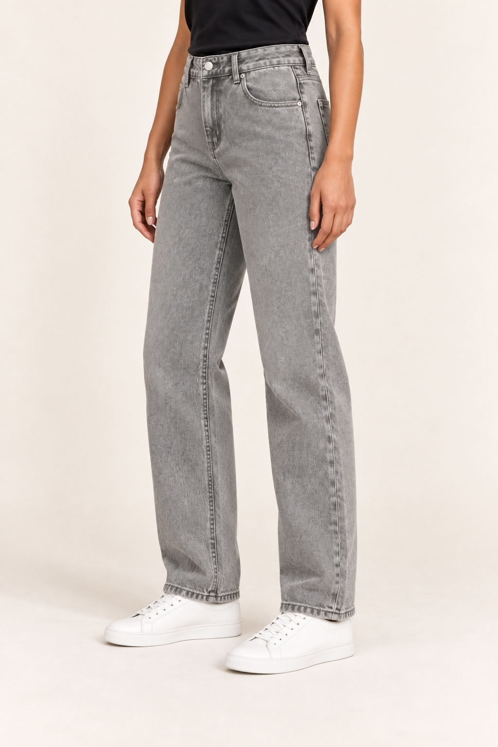 Worn Rhythm Straight Jeans in Light Gray. Three-quarter studio view showing the straight cut and ankle-length hems.