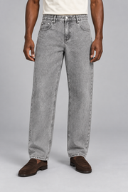Front studio view of Still Rhythm Straight Jeans in Light Gray, showing the washed straight leg and silver hardware.