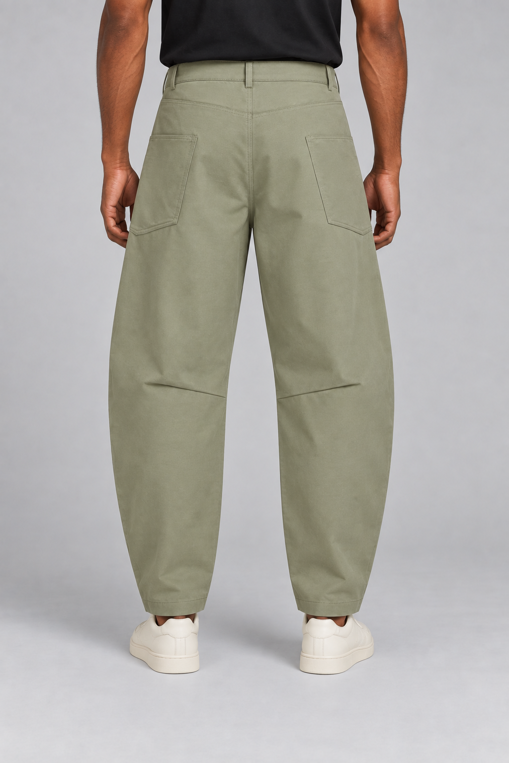Rear studio view of Field Arc Barrel Pants in Gray Green, showing side pocket placement and knee shaping darts.