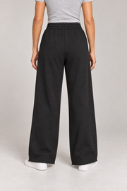 Rear studio view of Soft Pause Wide Leg Sweatpants in Black, showing the plain back and wide-leg drape.