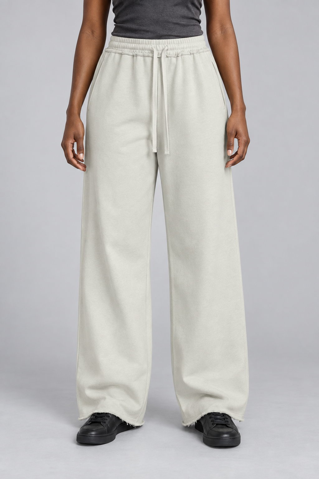 Front view of Soft Pause Wide Leg Sweatpants in White Gray, showing the high drawstring waist and raw hems.