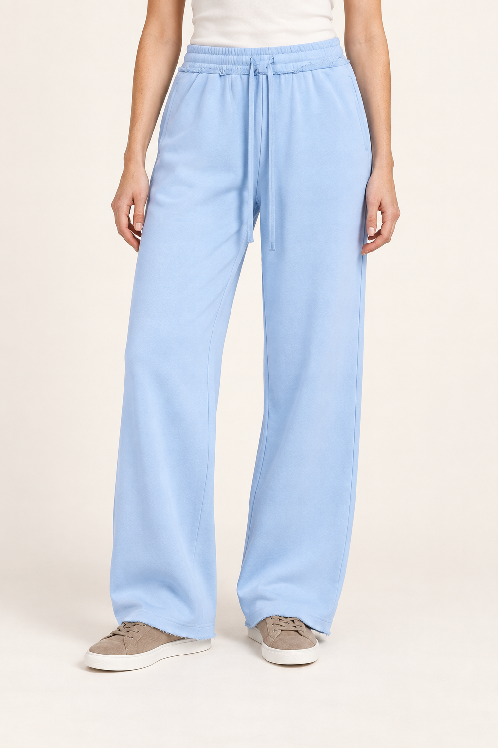 Front view of Soft Pause Wide Leg Sweatpants in Sky Blue, showing the high drawstring waist and raw hems.