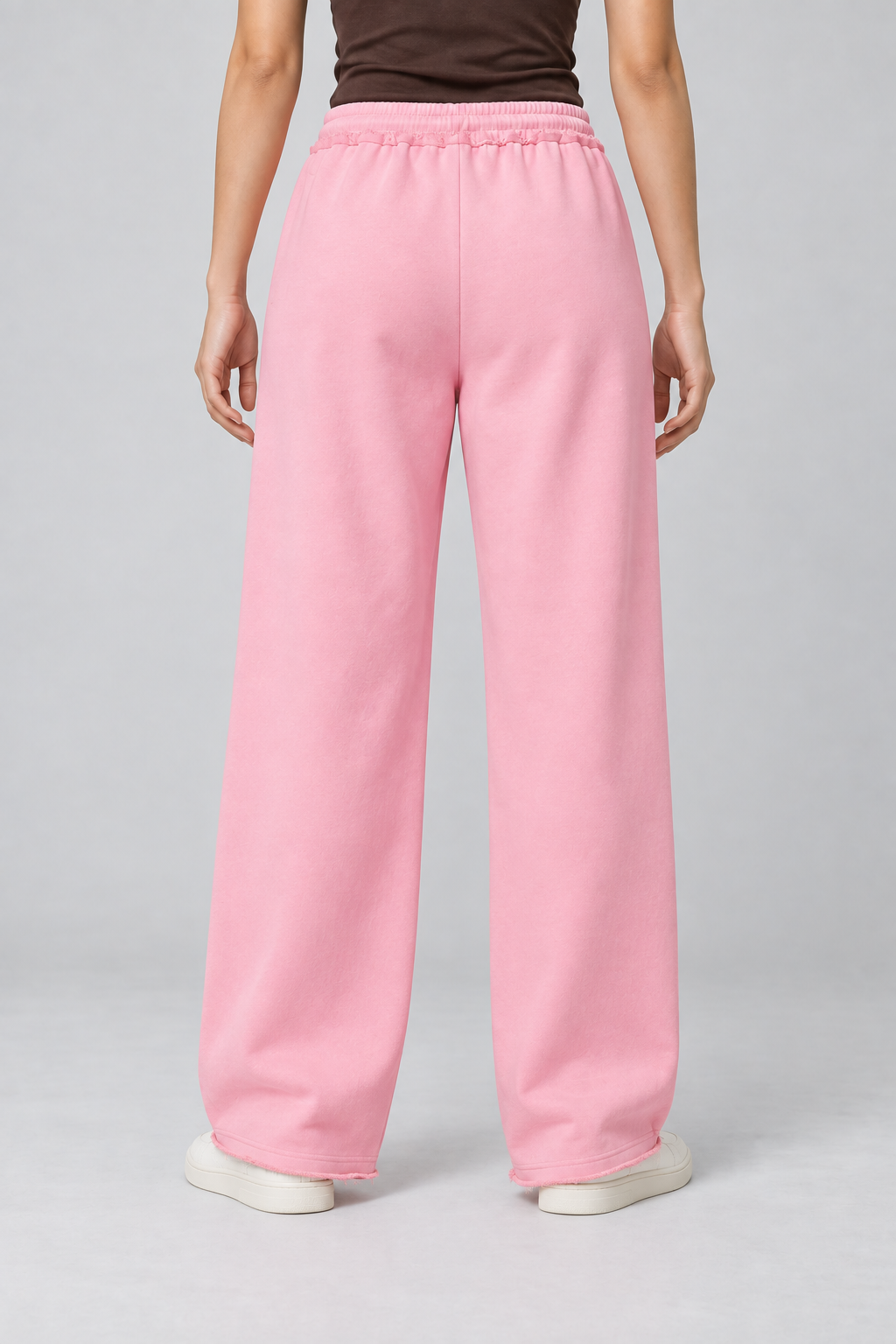Rear view of Soft Pause Wide Leg Sweatpants in Pink, showing the plain back and wide straight legs.