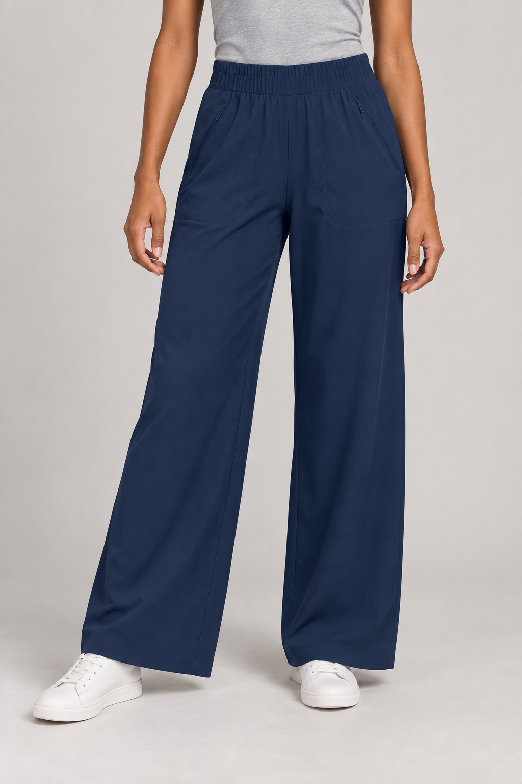 Front view of Open Flow Wide Leg Yoga Pants in Navy Blue, showing the elastic waist and zippered pockets.