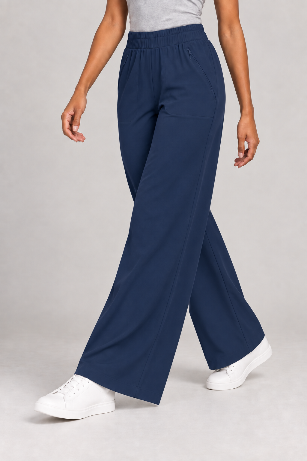 Three-quarter view of Open Flow Wide Leg Yoga Pants in Navy Blue, showing the lightweight drape and clean hems.