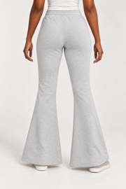 Rear view of Quiet Bell Flared Sweatpants in Flower Gray, showing the plain back and clean flared hems.