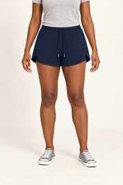 Front view of Soft Circuit Drawstring Shorts in Navy Blue, showing rounded hems and matching cords with metal tips.
