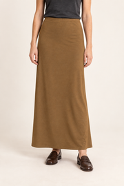 Front studio view of Quiet Column Knit Maxi Skirt in Brown, showing the plain long silhouette and simple elastic waist.