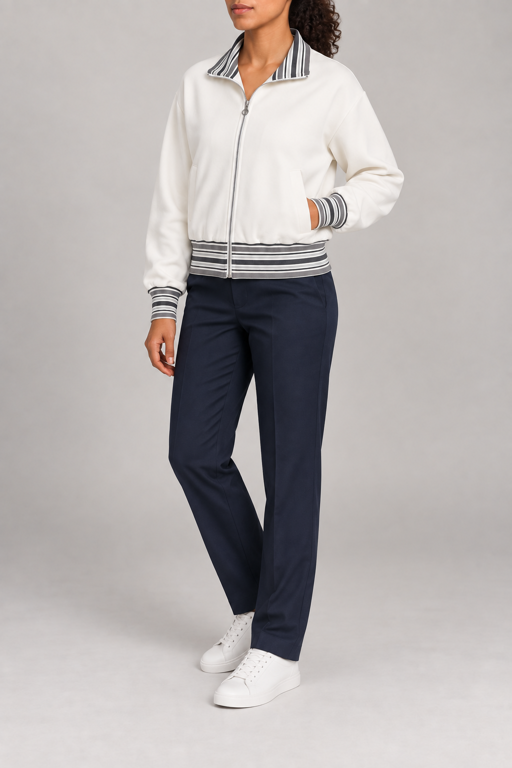 Three-quarter view of Club Tempo Rib Collar Jacket in Off White showing its boxy shape and discreet front pockets.