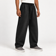 Three-quarter view of After Hours Barrel Fleece Sweatpants in Black showing slash pockets, shaped seams and straight hems.