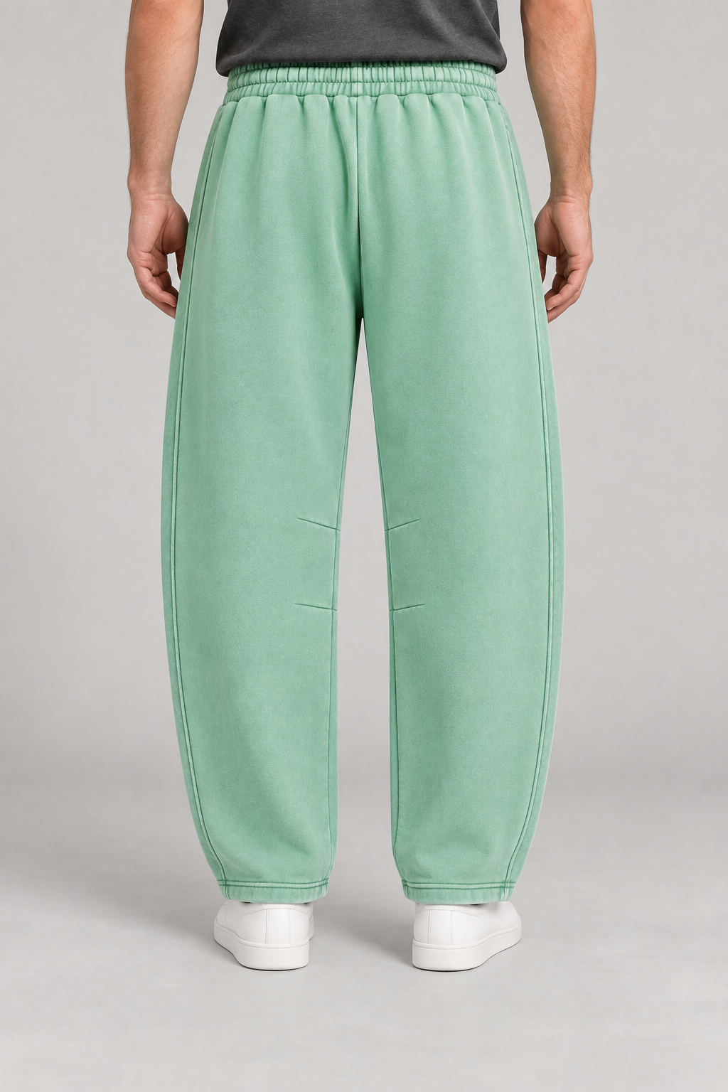 Rear view of After Hours Barrel Fleece Sweatpants in Mint Green showing the plain back and curved leg silhouette.