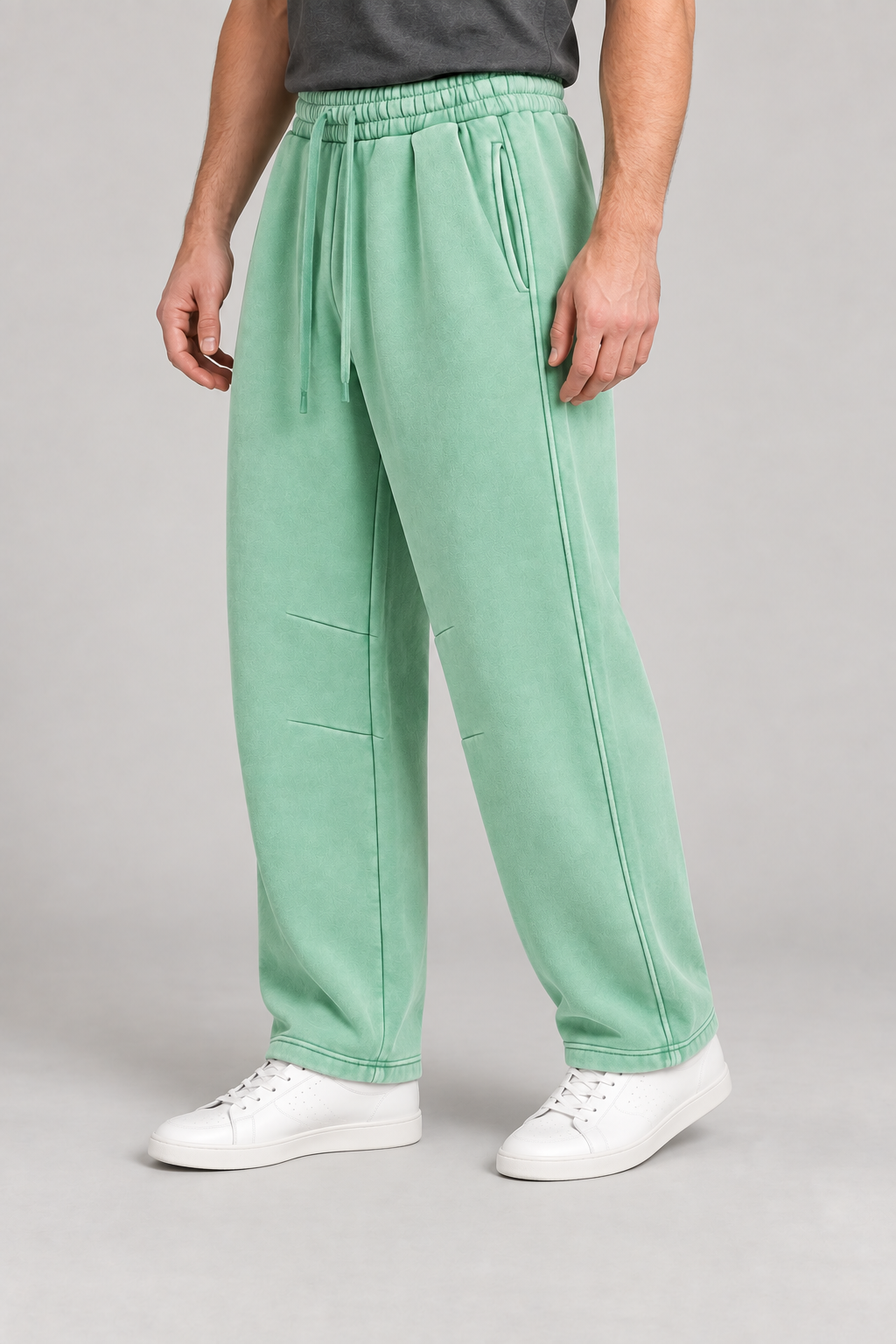 Three-quarter view of After Hours Barrel Fleece Sweatpants in Mint Green showing slash pockets, shaped seams and straight hems.