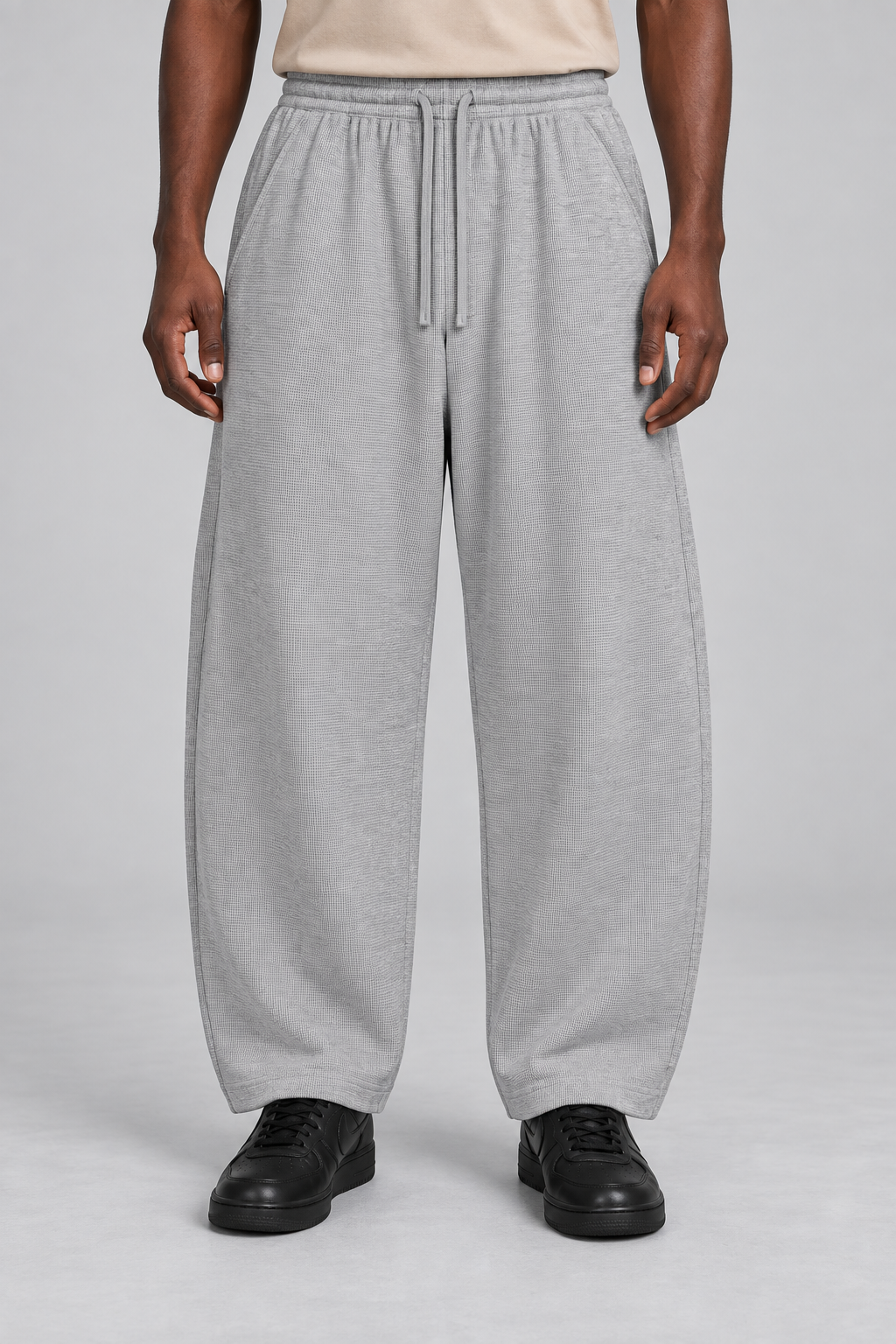 Front view of Soft Grid Waffle Barrel Pants in Flower Gray showing the fine knit texture and drawstring waist.