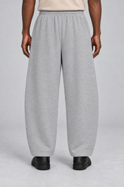 Rear view of Soft Grid Waffle Barrel Pants in Flower Gray showing the plain back and softly curved legs.