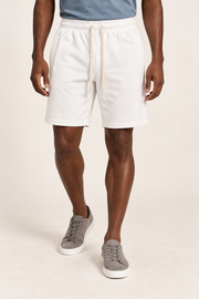 Front hero view of Clear Day Cotton Shorts in White, showing pale drawstrings and neat side pocket openings.