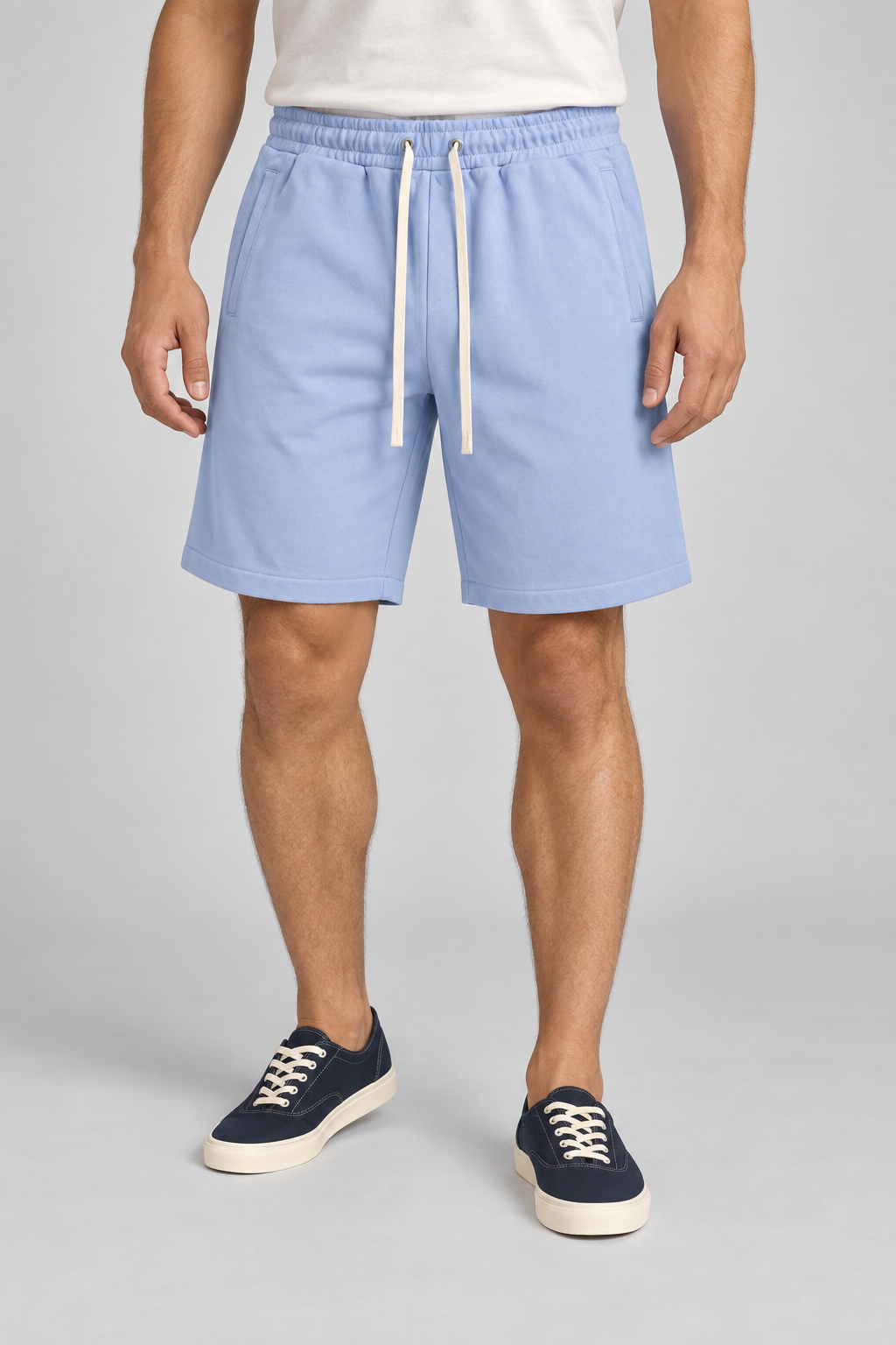 Front hero view of Clear Day Cotton Shorts in Sky Blue, showing pale drawstrings and neat side pocket openings.