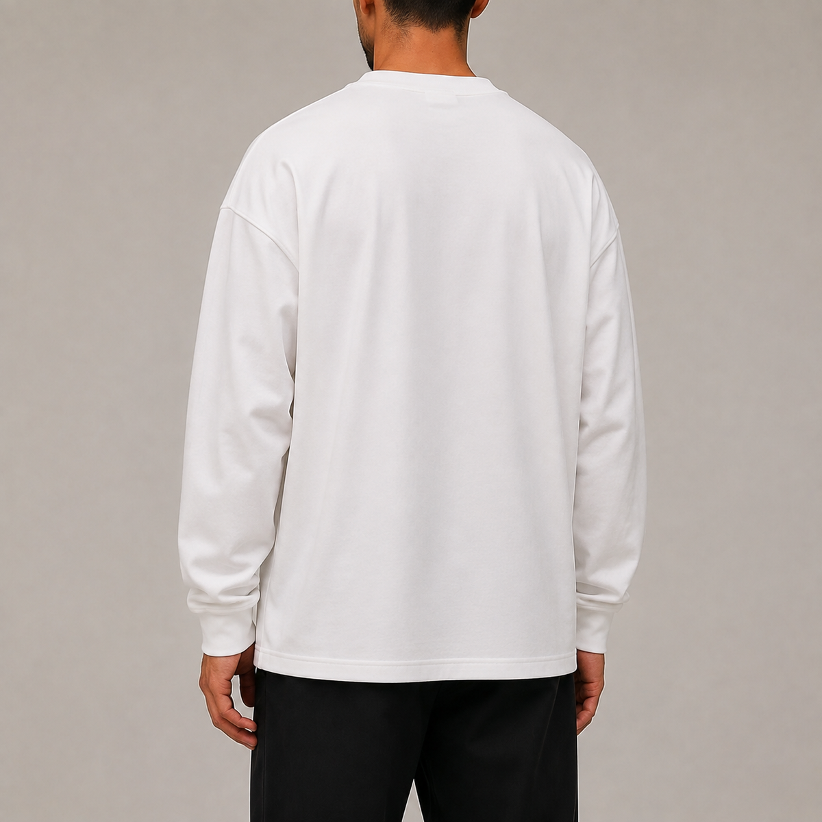 Back studio view of Archive Long Sleeve in White showing dropped shoulders and the plain back.
