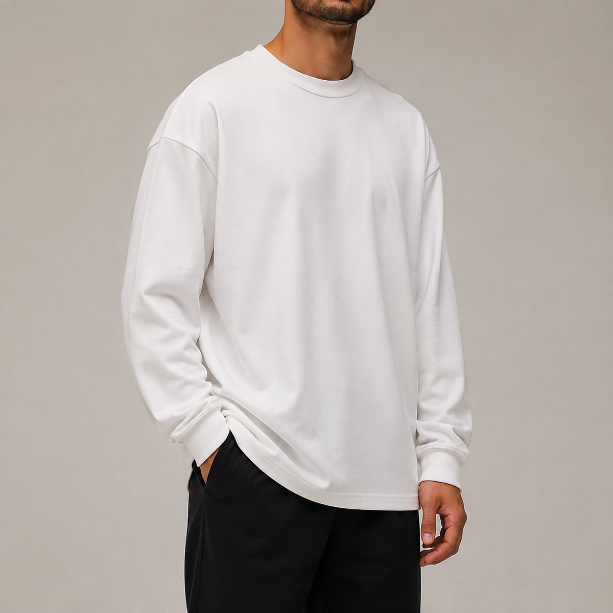 Front studio view of Archive Long Sleeve in White showing its oversized fit and clean plain finish.