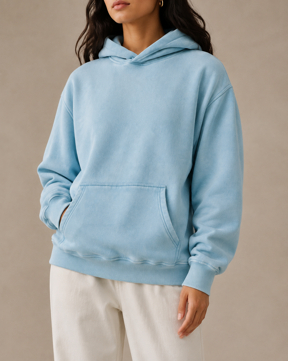 Front studio view of the plain TELLS Late Bloom Hoodie in Lake Blue, showing its oversized silhouette and kangaroo pocket.