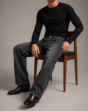 Still Straight Jeans in Dark Gray seated editorial view