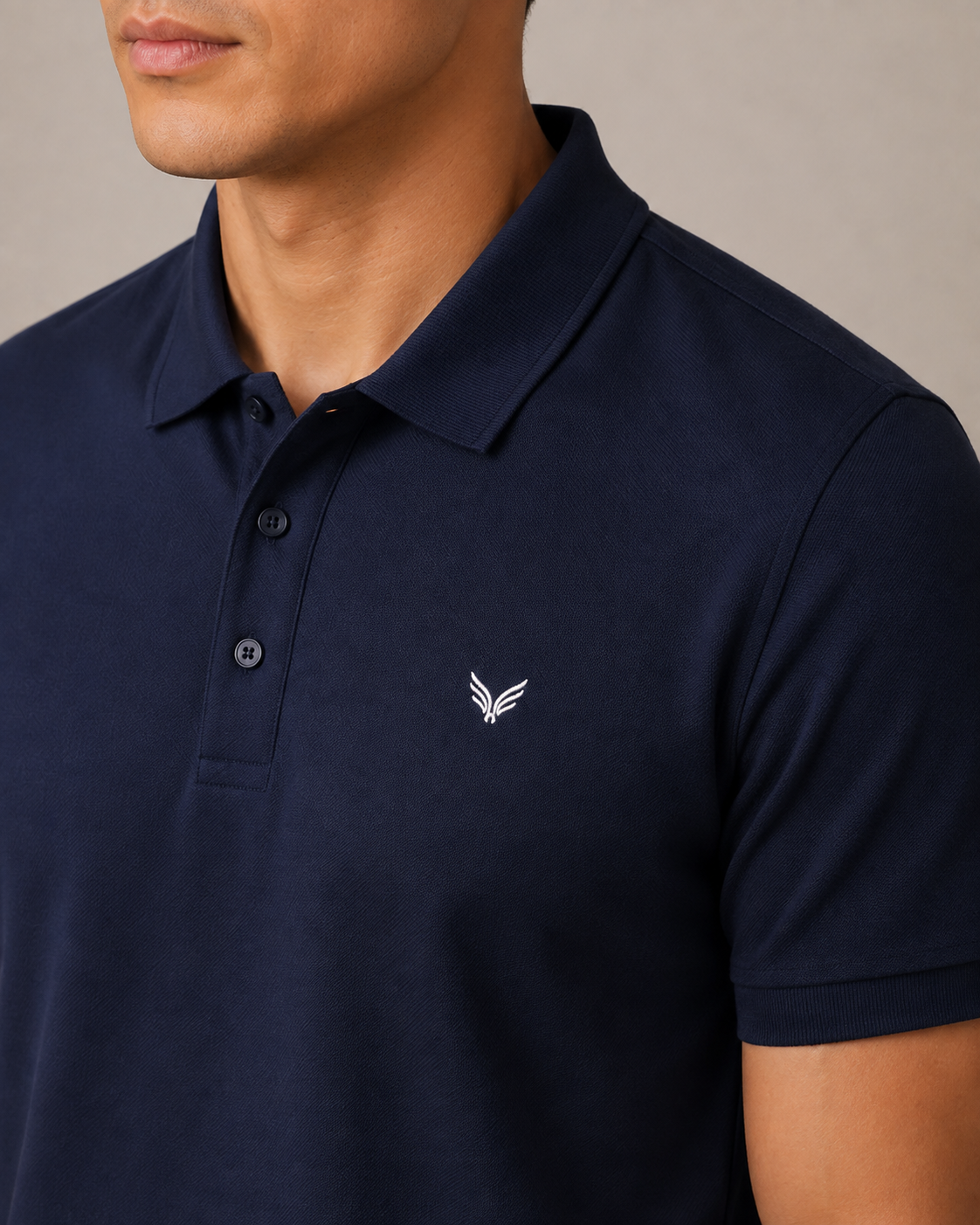 Meridian Pique Polo in Navy embroidery detail