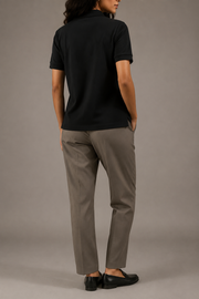 Back view of Studio Pique Polo in Black
